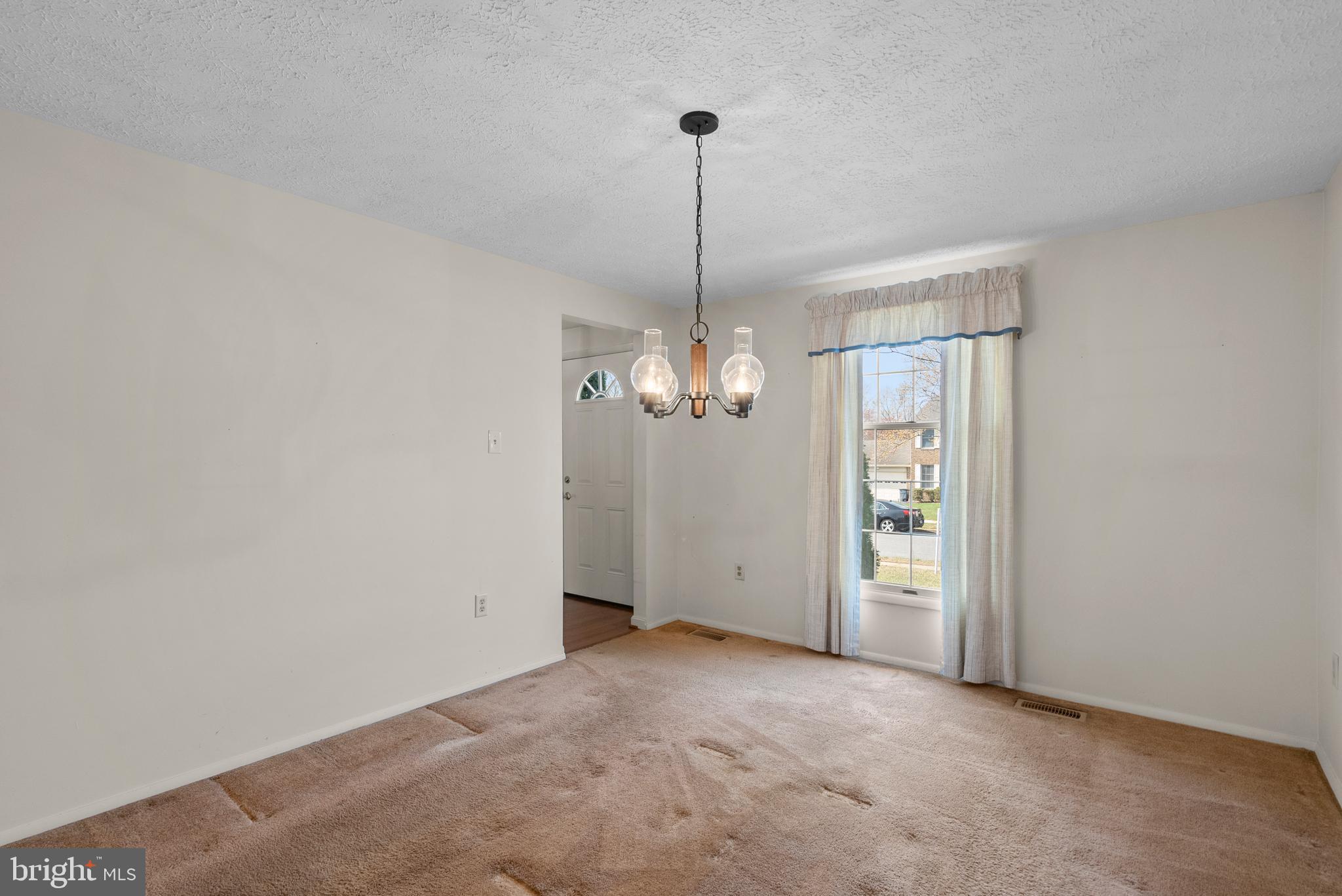 8745 Cardinal Forest Circle Laurel, MD 20723 - Photo 19 of 43 a view of a chandelier in big room and chandelier fan