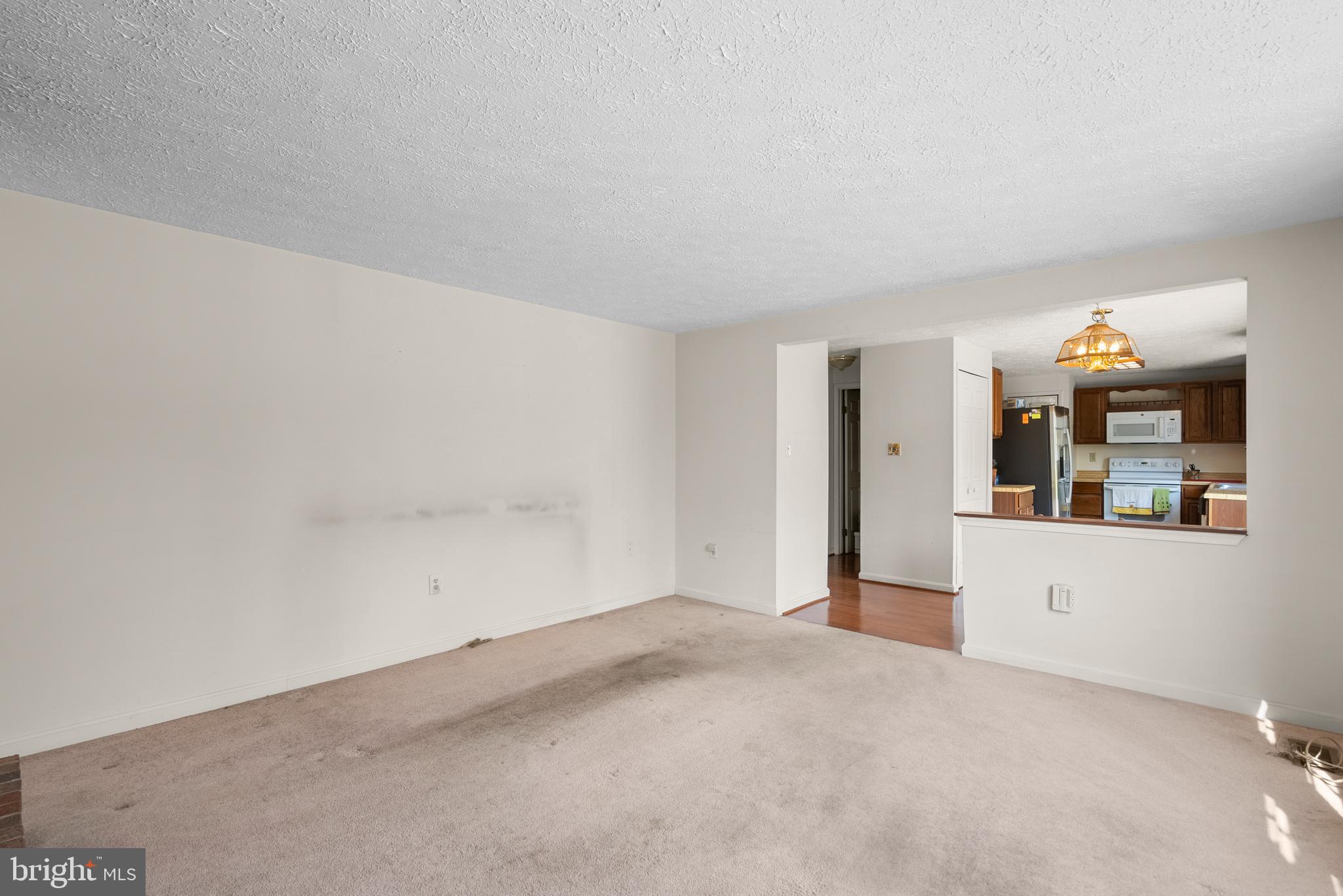 8745 Cardinal Forest Circle Laurel, MD 20723 - Photo 20 of 43 a view of an empty room with a window