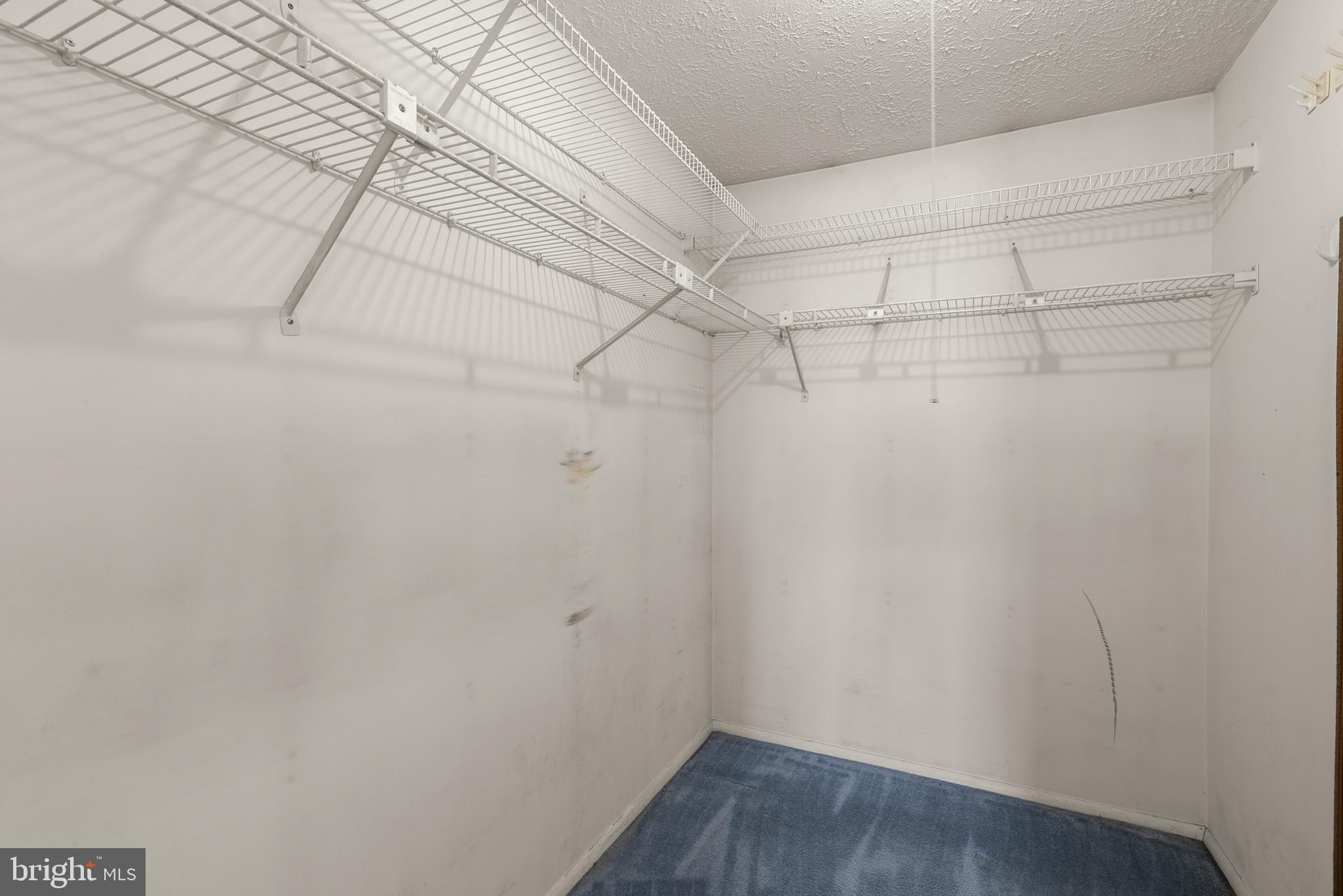 8745 Cardinal Forest Circle Laurel, MD 20723 - Photo 25 of 43 a view of a room with racks on the wall