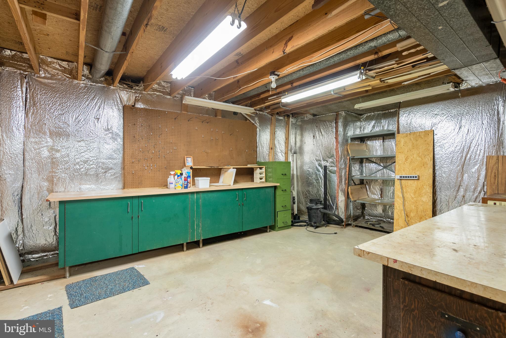 8745 Cardinal Forest Circle Laurel, MD 20723 - Photo 35 of 43 a kitchen with a refrigerator and a sink