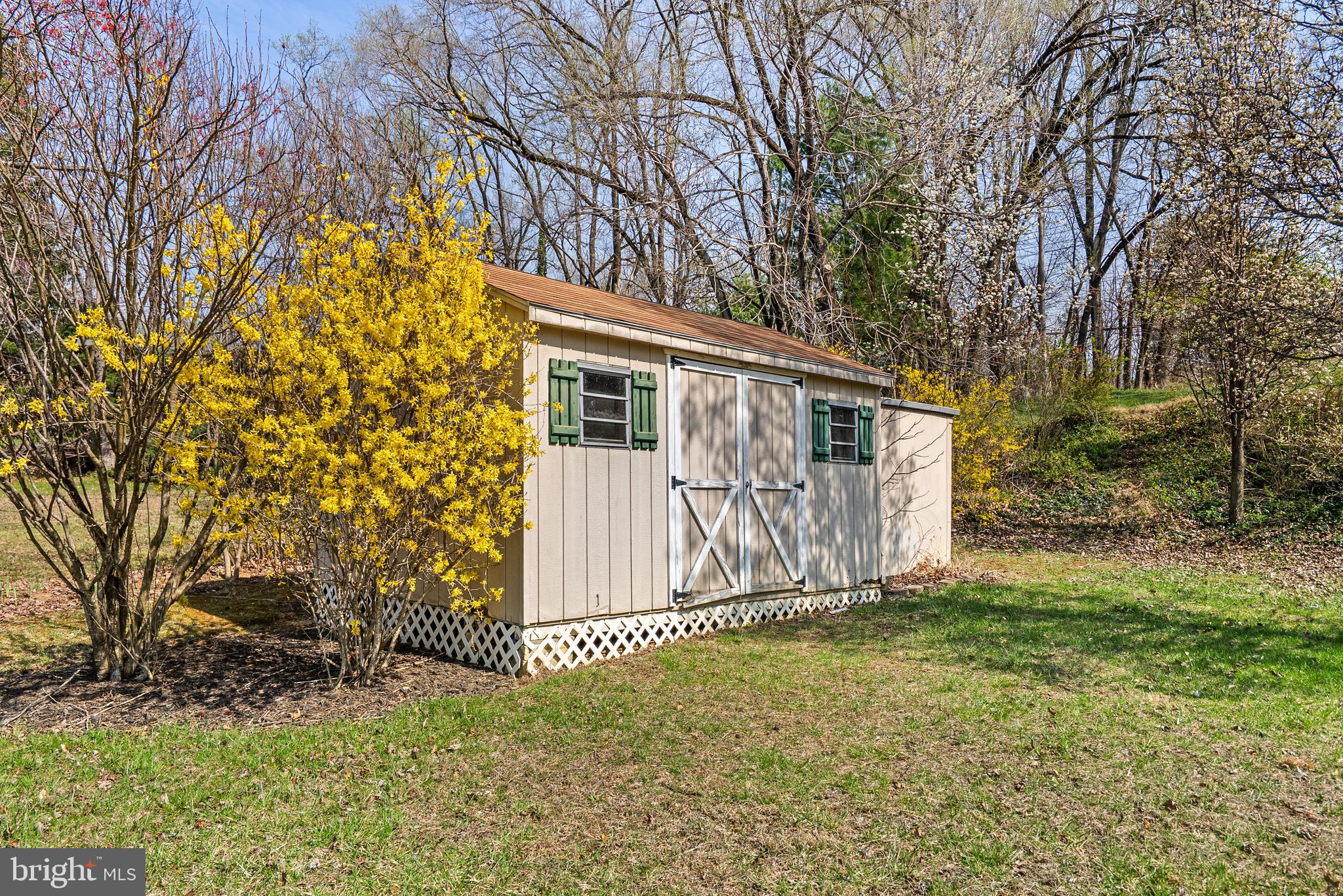 8745 Cardinal Forest Circle Laurel, MD 20723 - Photo 39 of 43 a view of a house with a yard