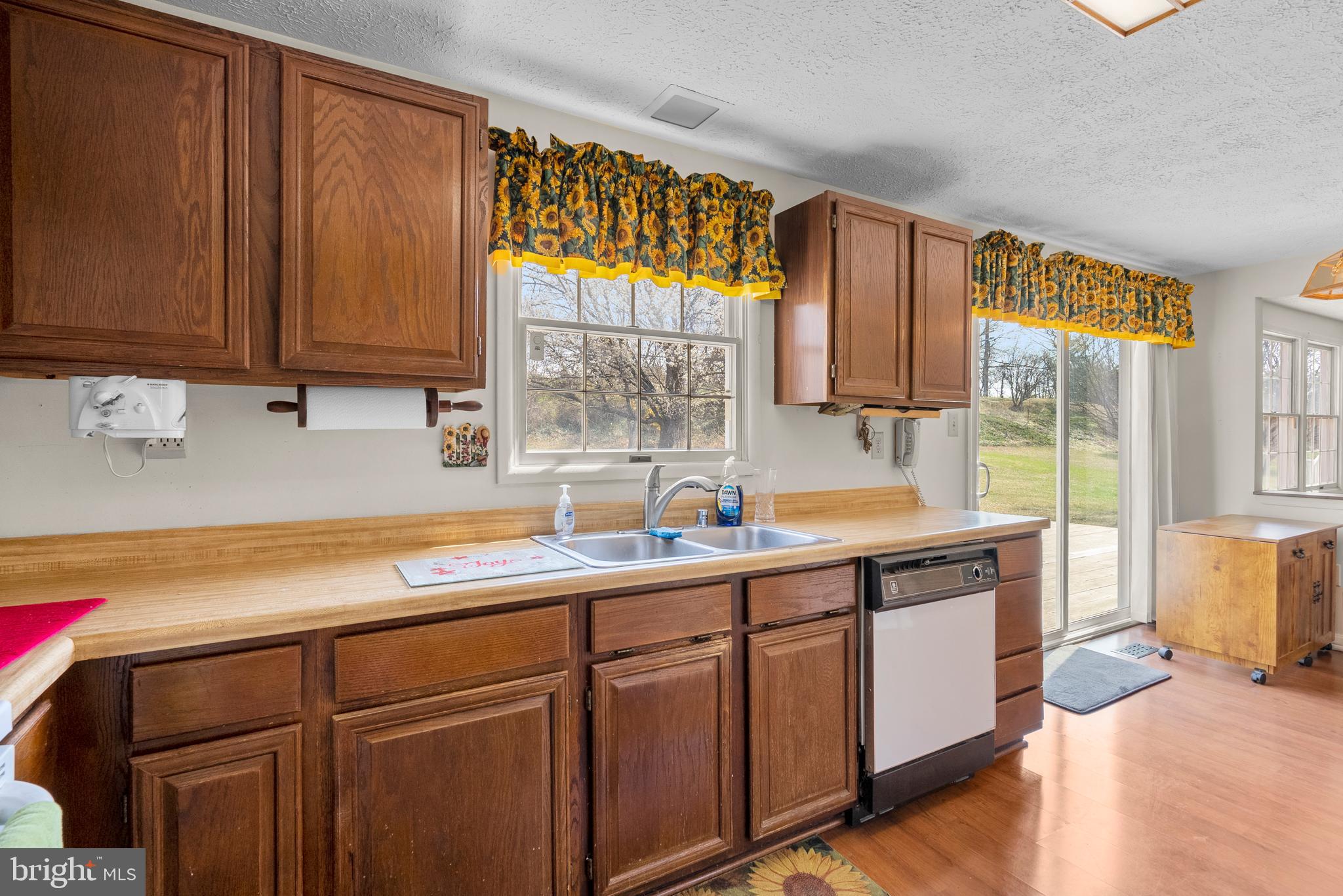 8745 Cardinal Forest Circle Laurel, MD 20723 - Photo 9 of 43 a kitchen with a sink and a window