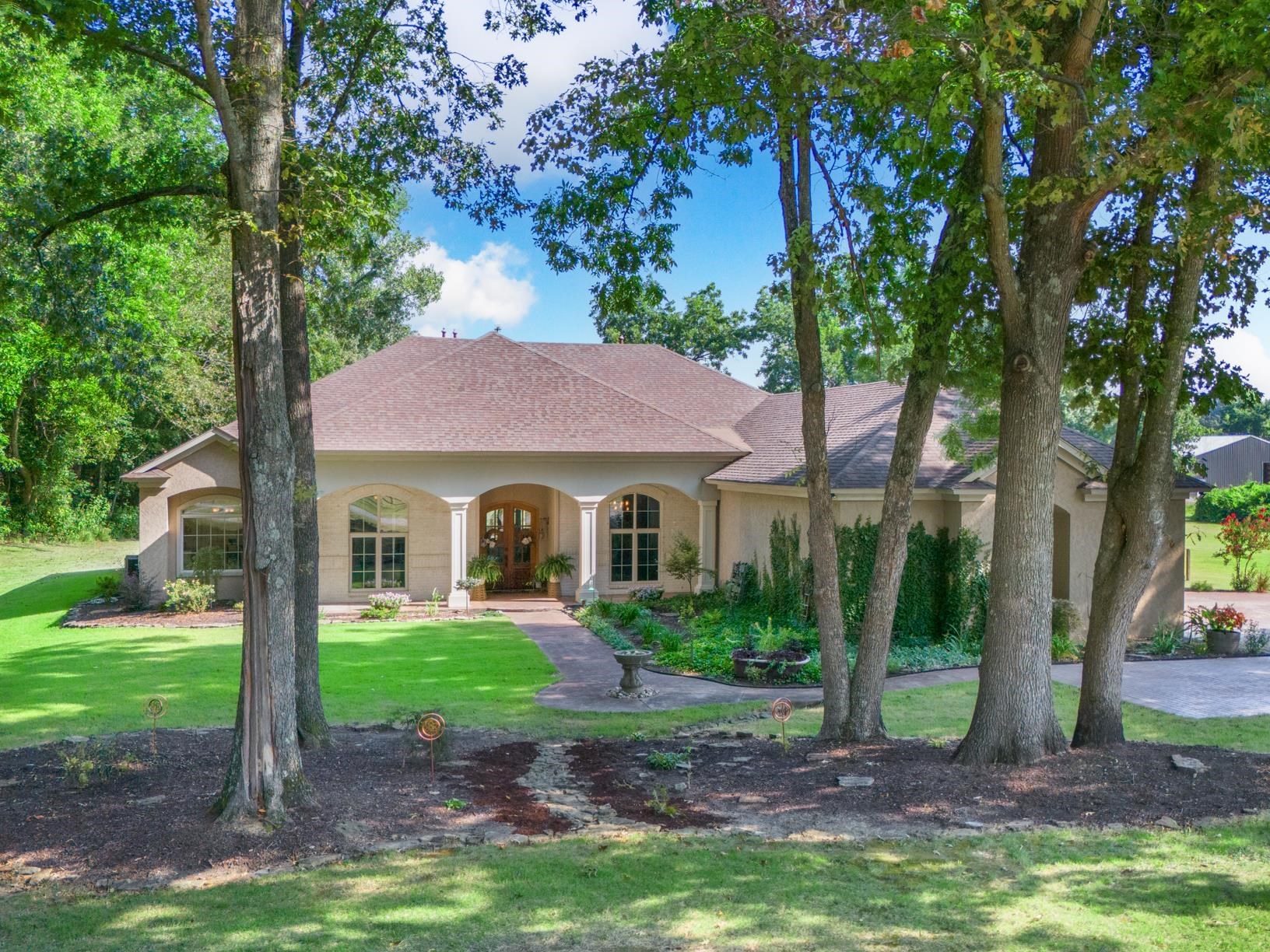 746 Kelly Corner Road Covington, TN 38019 - Photo 1 of 40 View of front of house featuring a front lawn