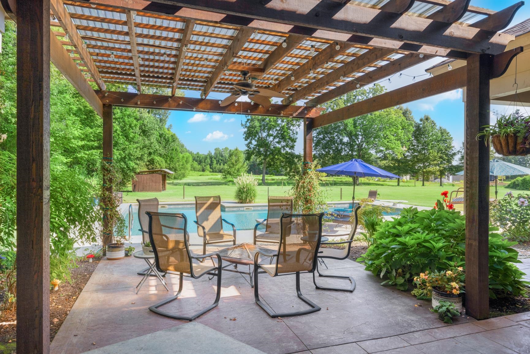 746 Kelly Corner Road Covington, TN 38019 - Photo 29 of 40 View of patio / terrace with ceiling fan and a pergola