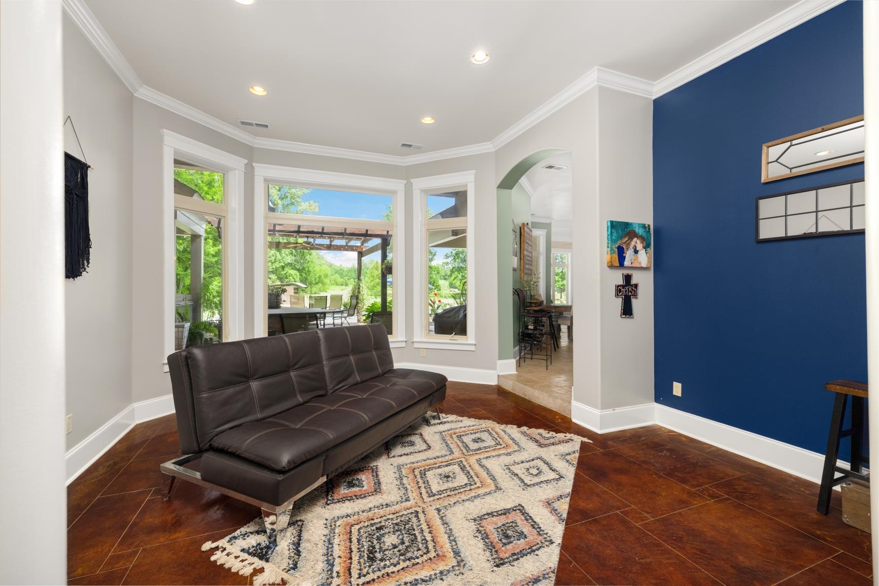 746 Kelly Corner Road Covington, TN 38019 - Photo 6 of 40 Tiled living room with ornamental molding
