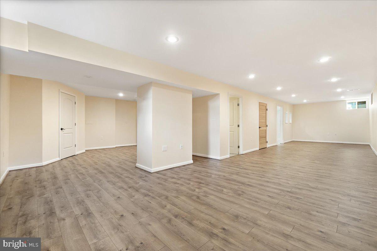 1712 Wheyfield Drive Frederick, MD 21701 - Photo 34 of 64 a view of an empty room with wooden floor