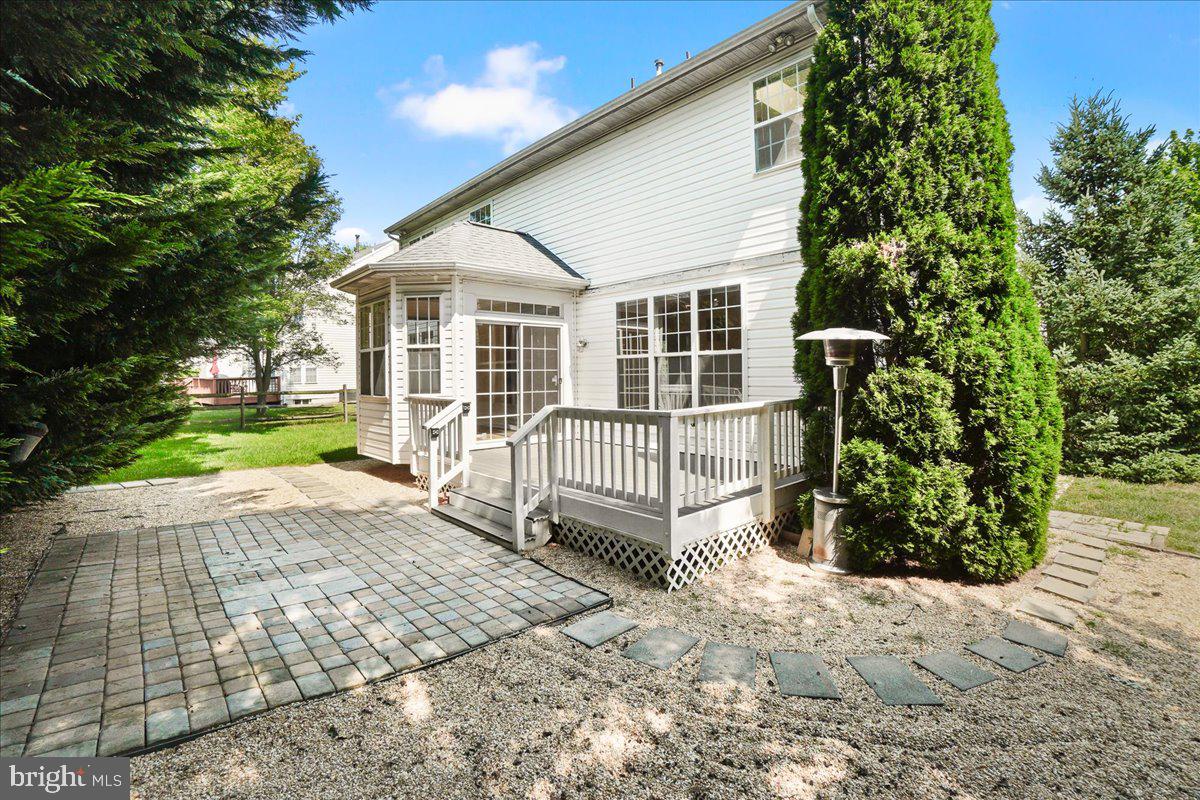 1712 Wheyfield Drive Frederick, MD 21701 - Photo 45 of 64 a view of a house with a yard and potted plants