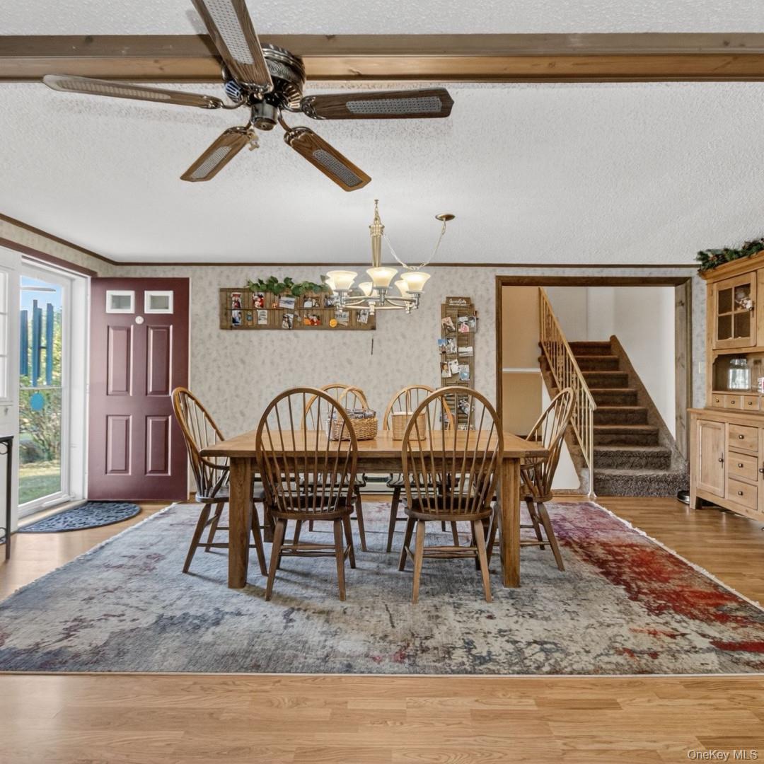 69 Crabby Road Loch Sheldrake, NY 12759 - Photo 11 of 20 a view of a dining room with furniture