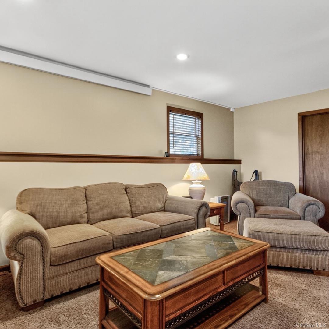 69 Crabby Road Loch Sheldrake, NY 12759 - Photo 7 of 20 a living room with furniture