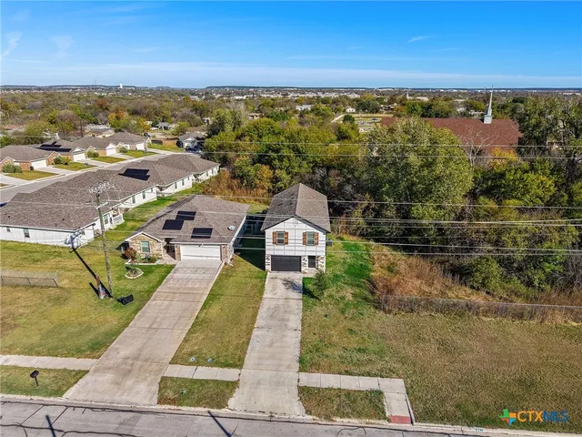 a view of a city with ocean view