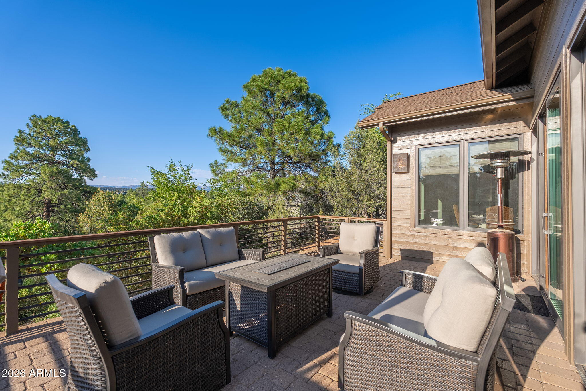 2208 East Filaree Circle Payson, AZ 85541 - Photo 33 of 60 a view of a patio with couches chairs and potted plants