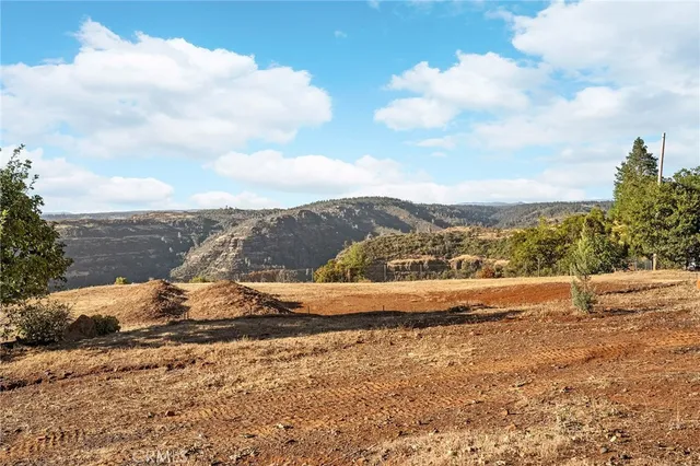 a view of a road with an ocean view