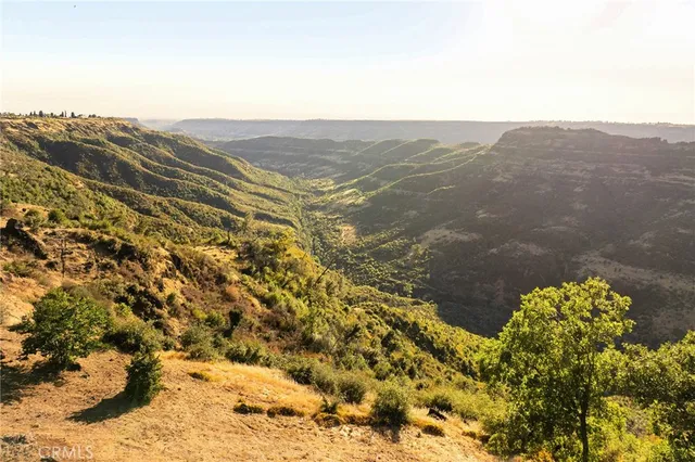 an aerial view of residential building and parking space