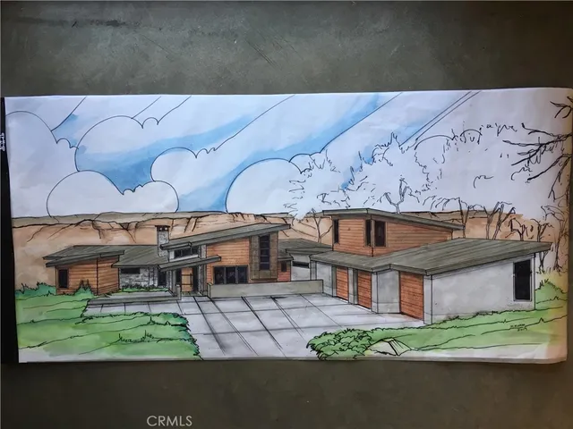 an aerial view of residential building and parking space