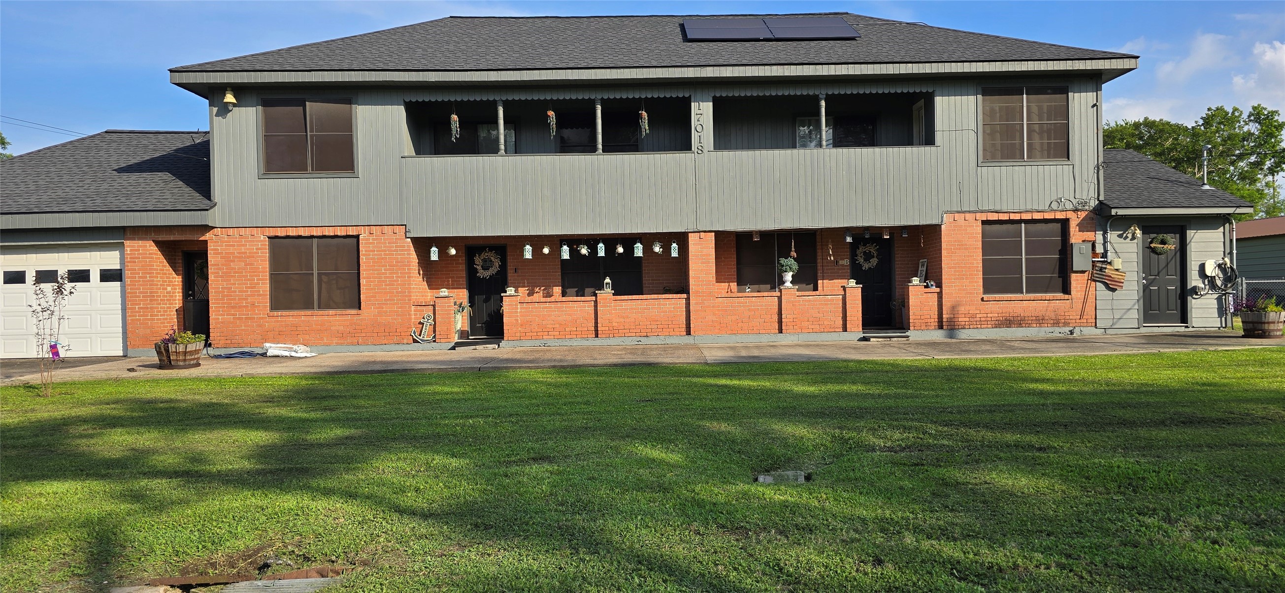 17018 Water Oak Drive Channelview, TX 77530 - Photo 1 of 40 a view of a house with a yard