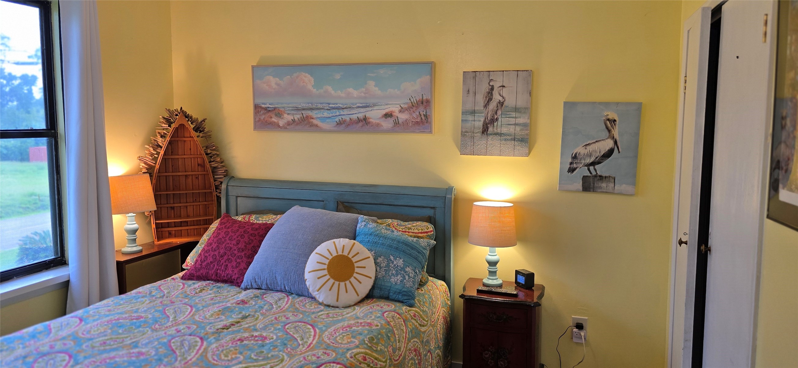 17018 Water Oak Drive Channelview, TX 77530 - Photo 11 of 40 a bedroom with a bed and a lamp on dresser