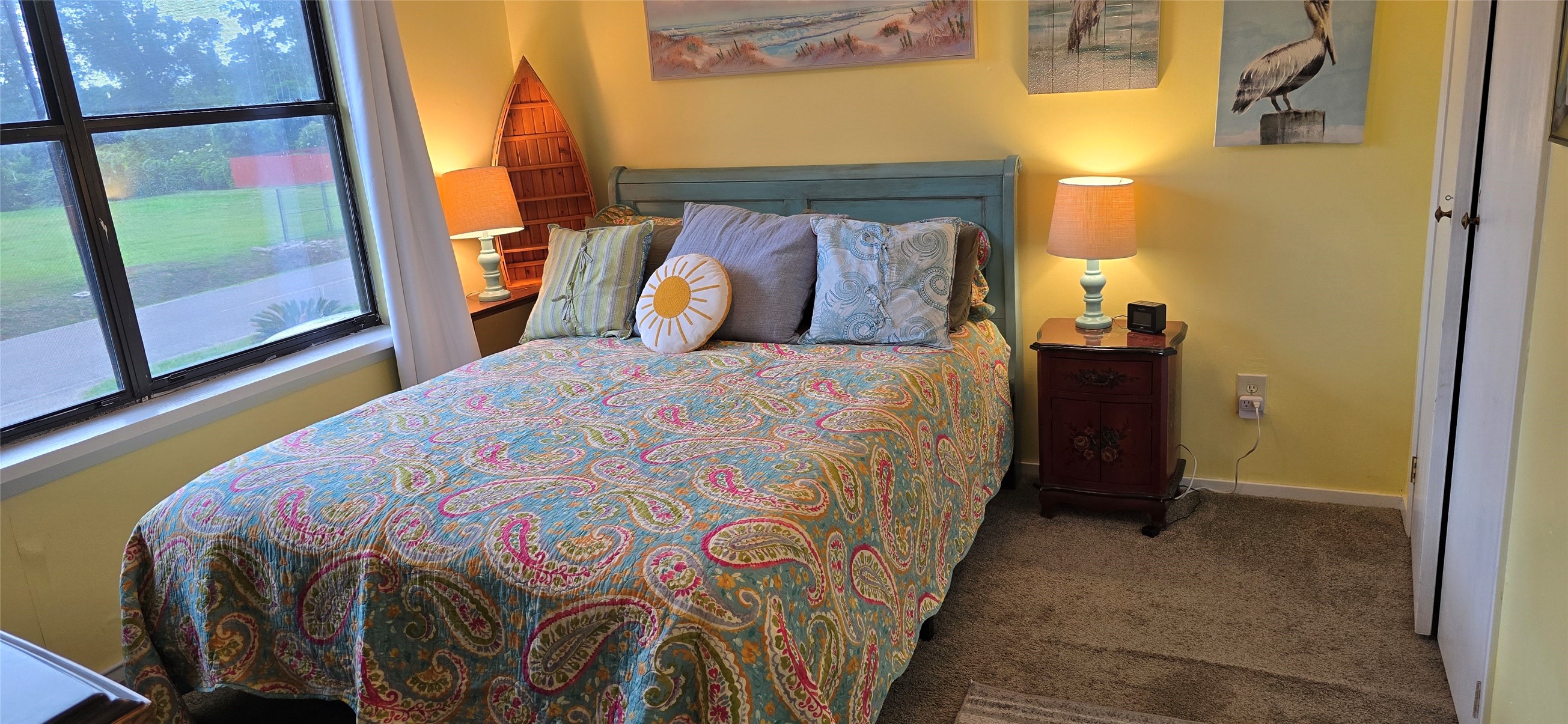 17018 Water Oak Drive Channelview, TX 77530 - Photo 12 of 40 a bed sitting in a bedroom next to a window
