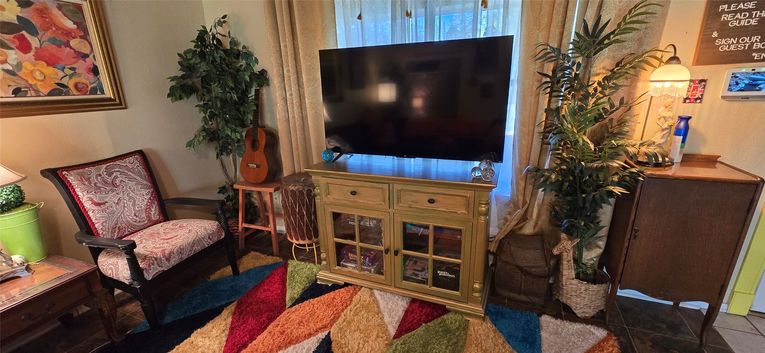 17018 Water Oak Drive Channelview, TX 77530 - Photo 14 of 40 a living room with furniture and a flat screen tv