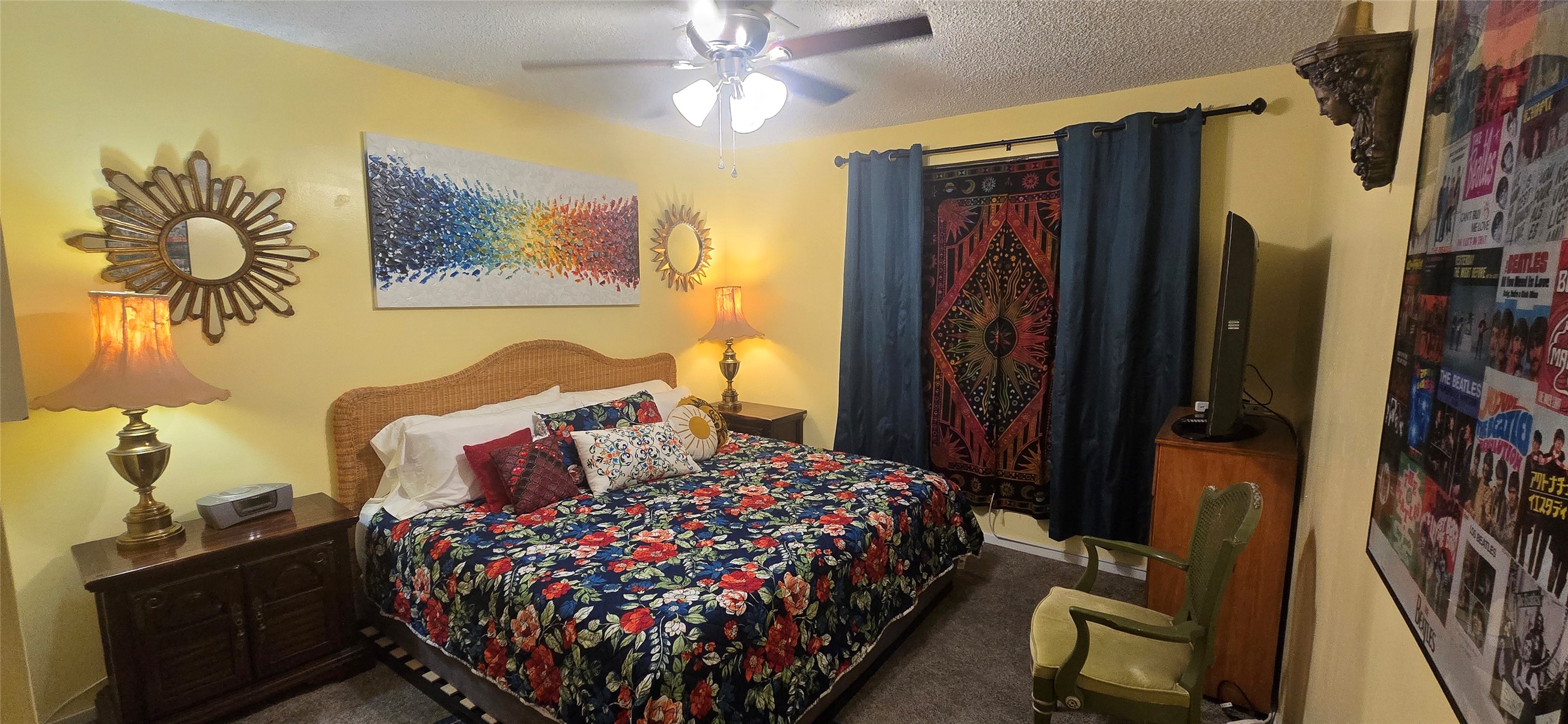 17018 Water Oak Drive Channelview, TX 77530 - Photo 16 of 40 a bedroom with a bed painting on wall and a large mirror