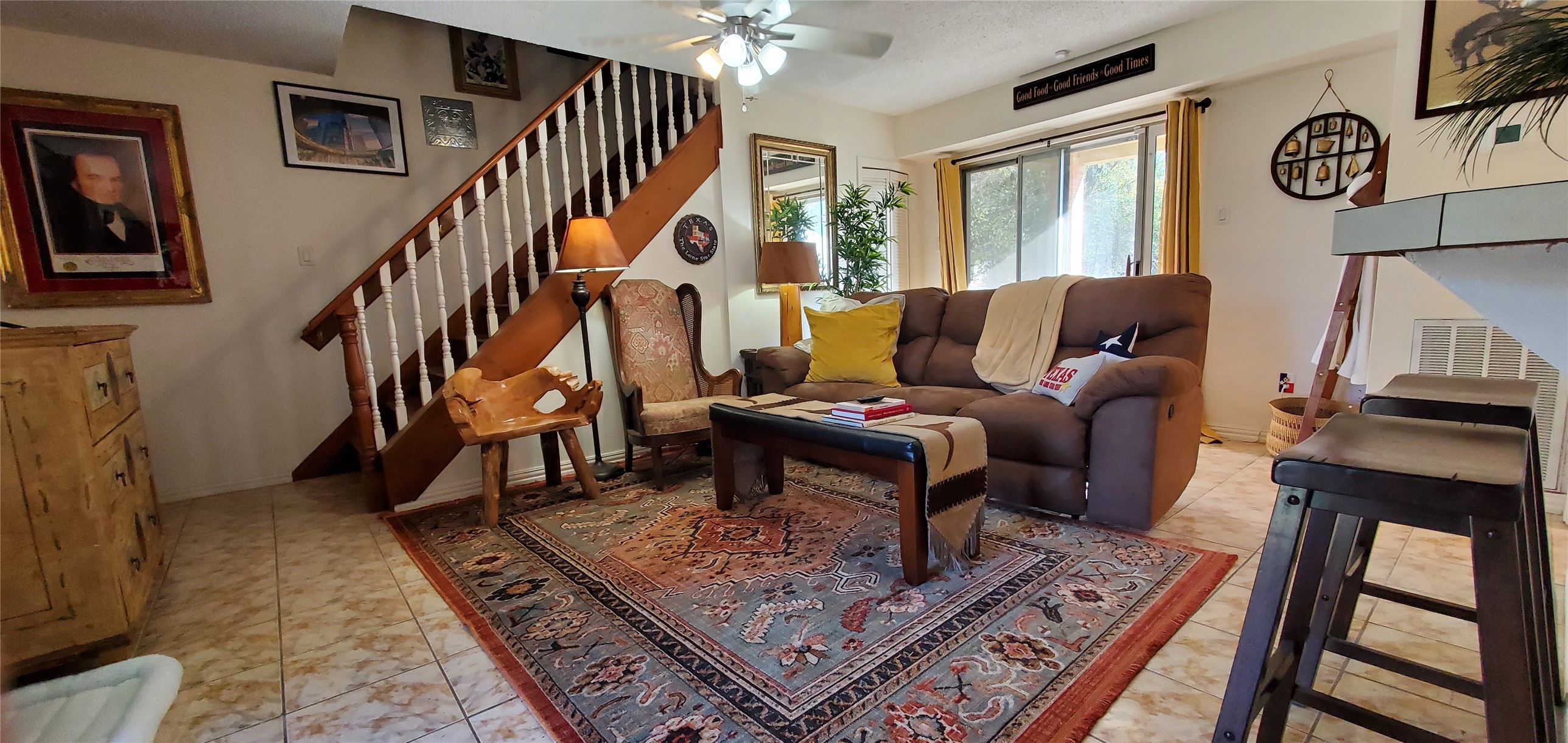 17018 Water Oak Drive Channelview, TX 77530 - Photo 23 of 40 a living room with furniture a rug and a window