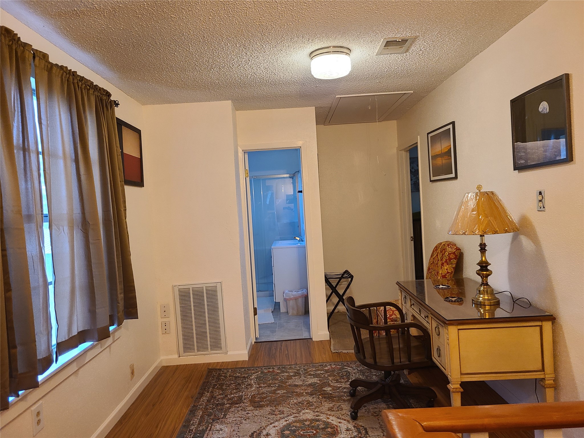 17018 Water Oak Drive Channelview, TX 77530 - Photo 25 of 40 a view of room with furniture and wooden floor