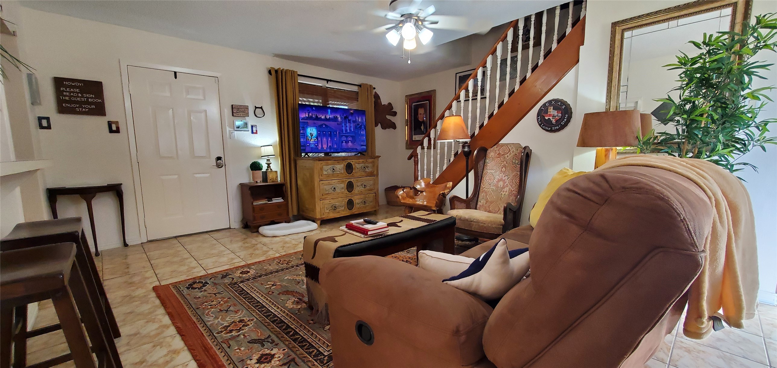 17018 Water Oak Drive Channelview, TX 77530 - Photo 26 of 40 a room with furniture and stairs