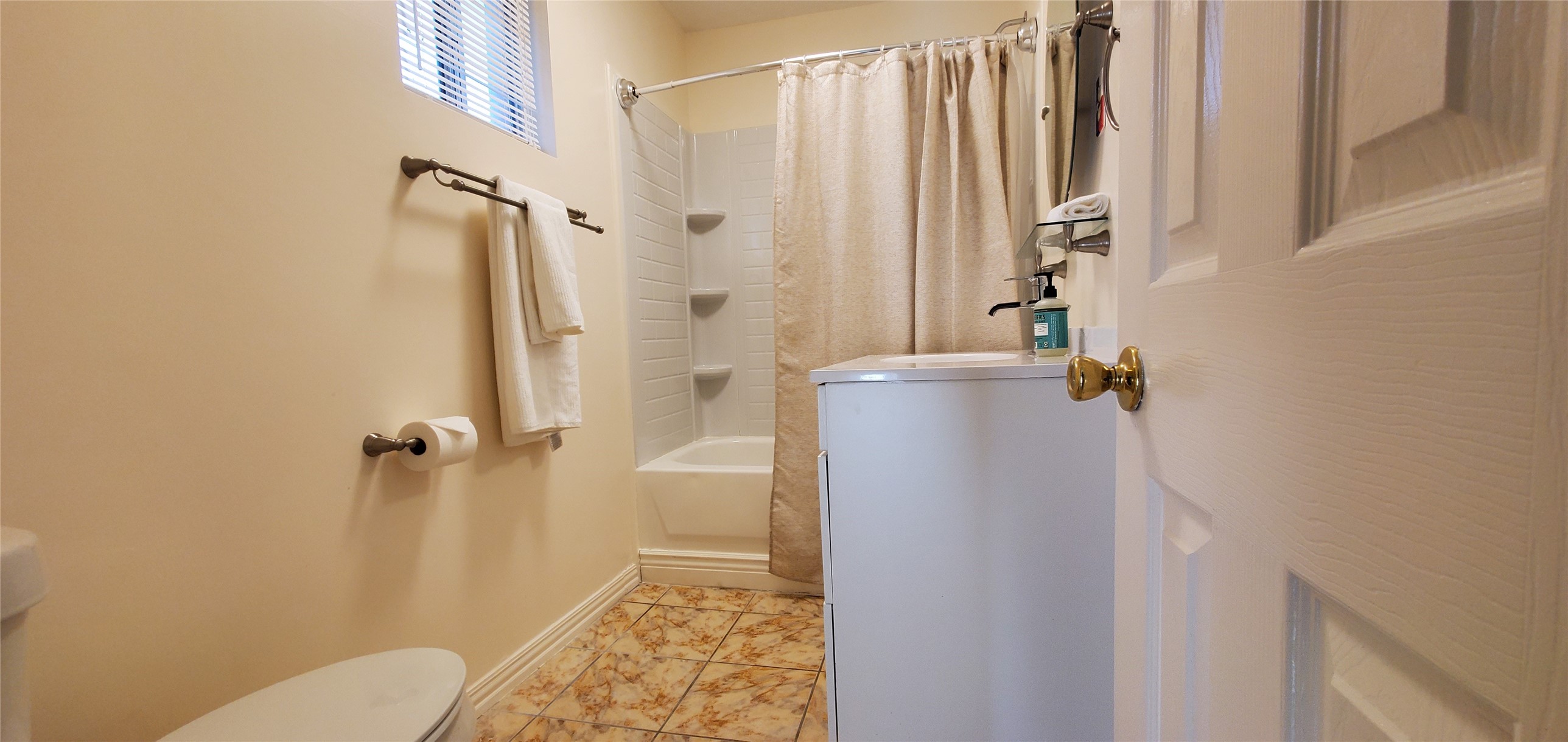 17018 Water Oak Drive Channelview, TX 77530 - Photo 27 of 40 a bathroom with a shower toilet and sink