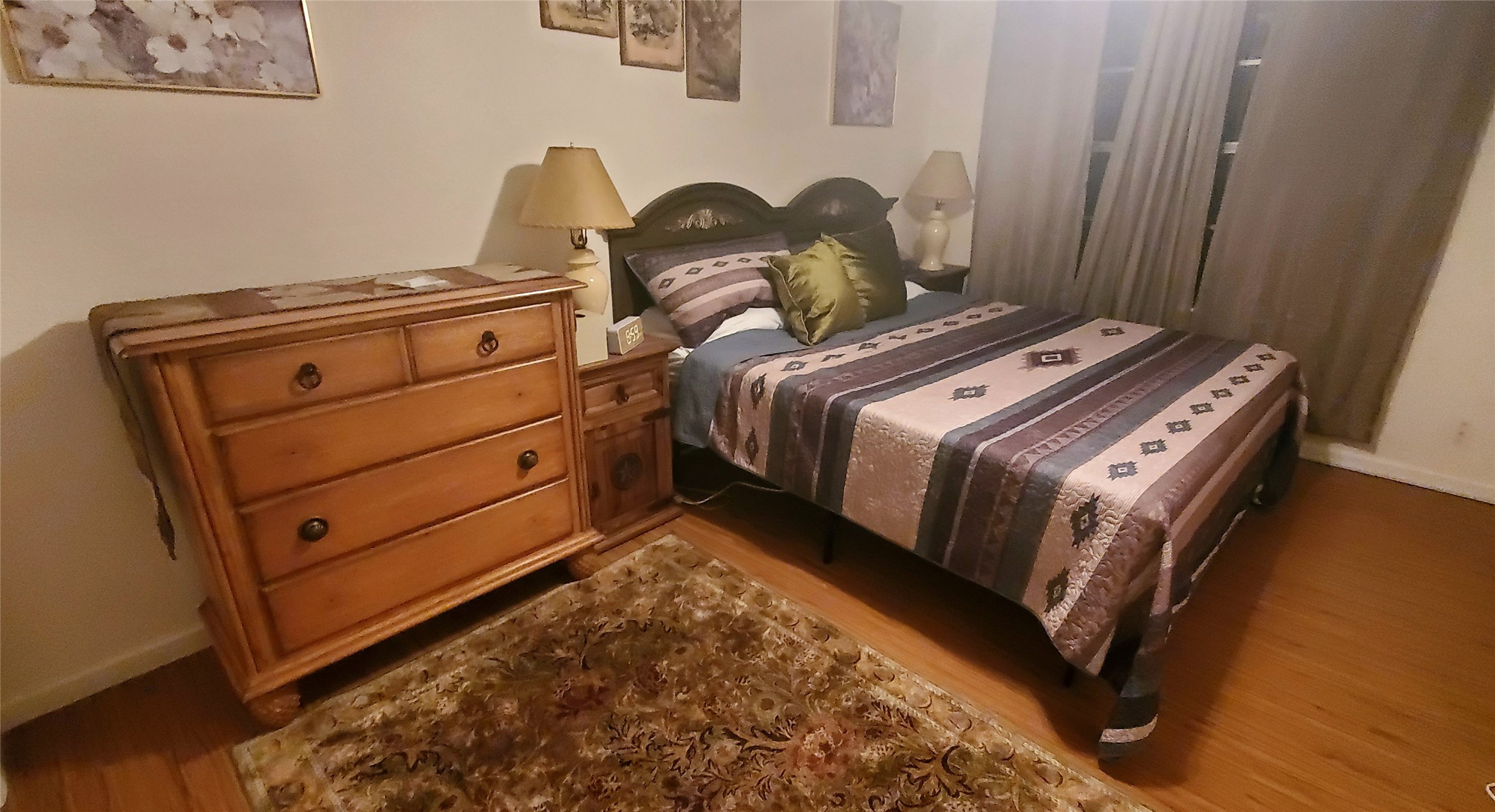 17018 Water Oak Drive Channelview, TX 77530 - Photo 32 of 40 a bedroom with a bed and a dresser