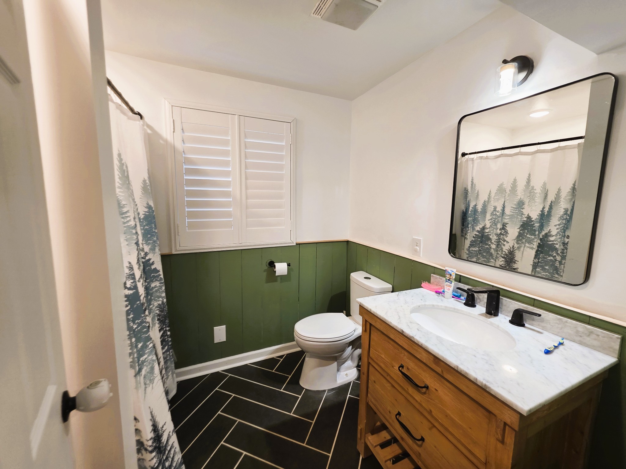 1975 Kelly Road Holladay, TN 38341 - Photo 61 of 95 a bathroom with a sink toilet and mirror