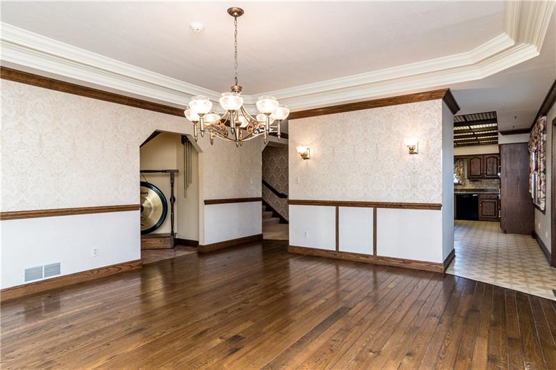 714 Clearfield Road Fenelton, PA 16034 - Photo 4 of 25 Dining room with detailed molding, tray ceiling and plenty of room to entertain.