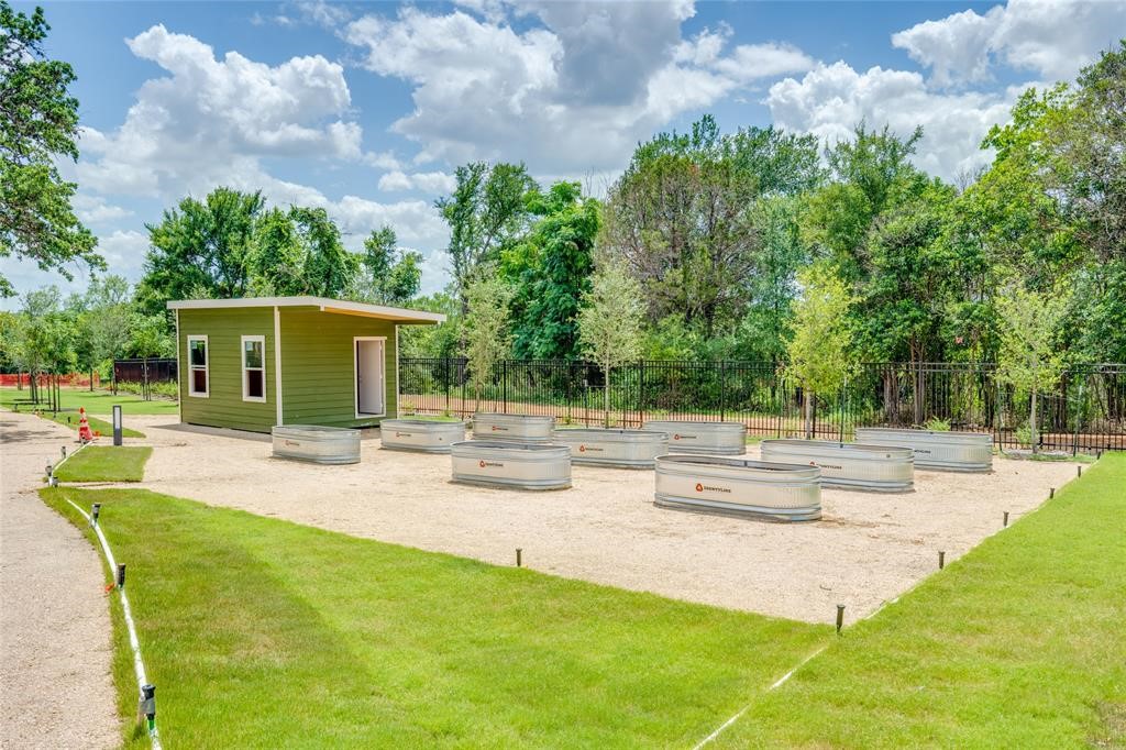 4802 South Congress Avenue, Unit 311 Austin, TX 78745 - Photo 15 of 18 a view of a house with backyard and sitting area