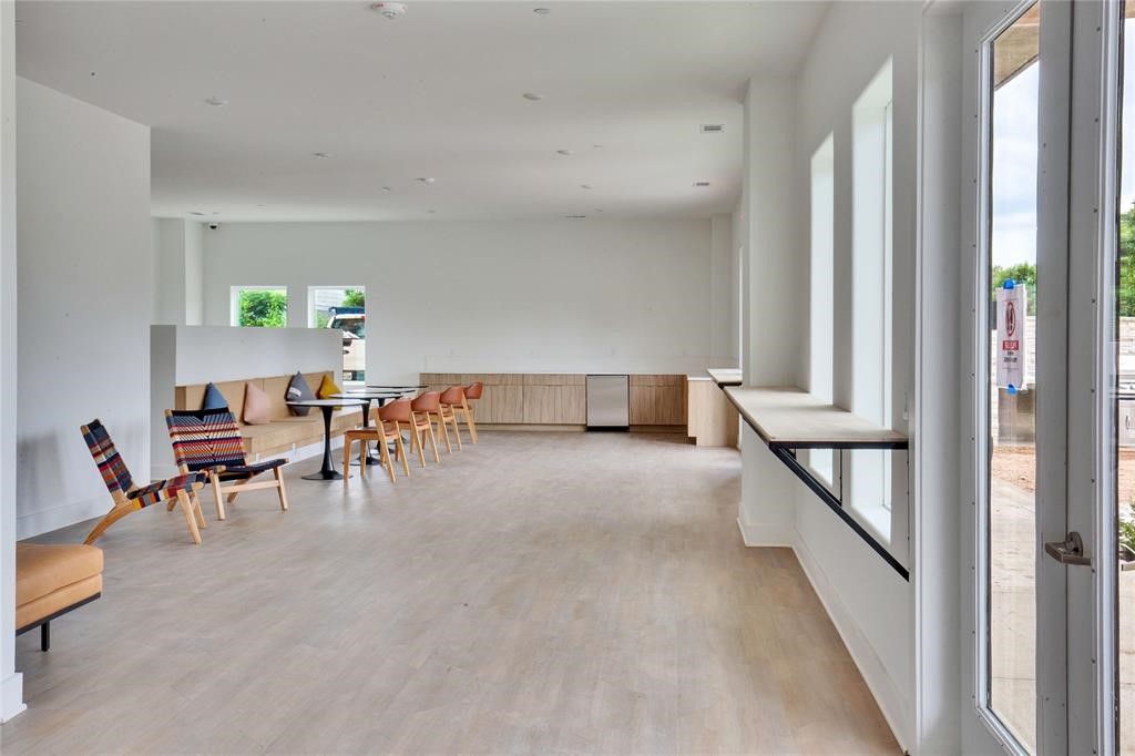 4802 South Congress Avenue, Unit 311 Austin, TX 78745 - Photo 18 of 18 a living room with furniture and a large window