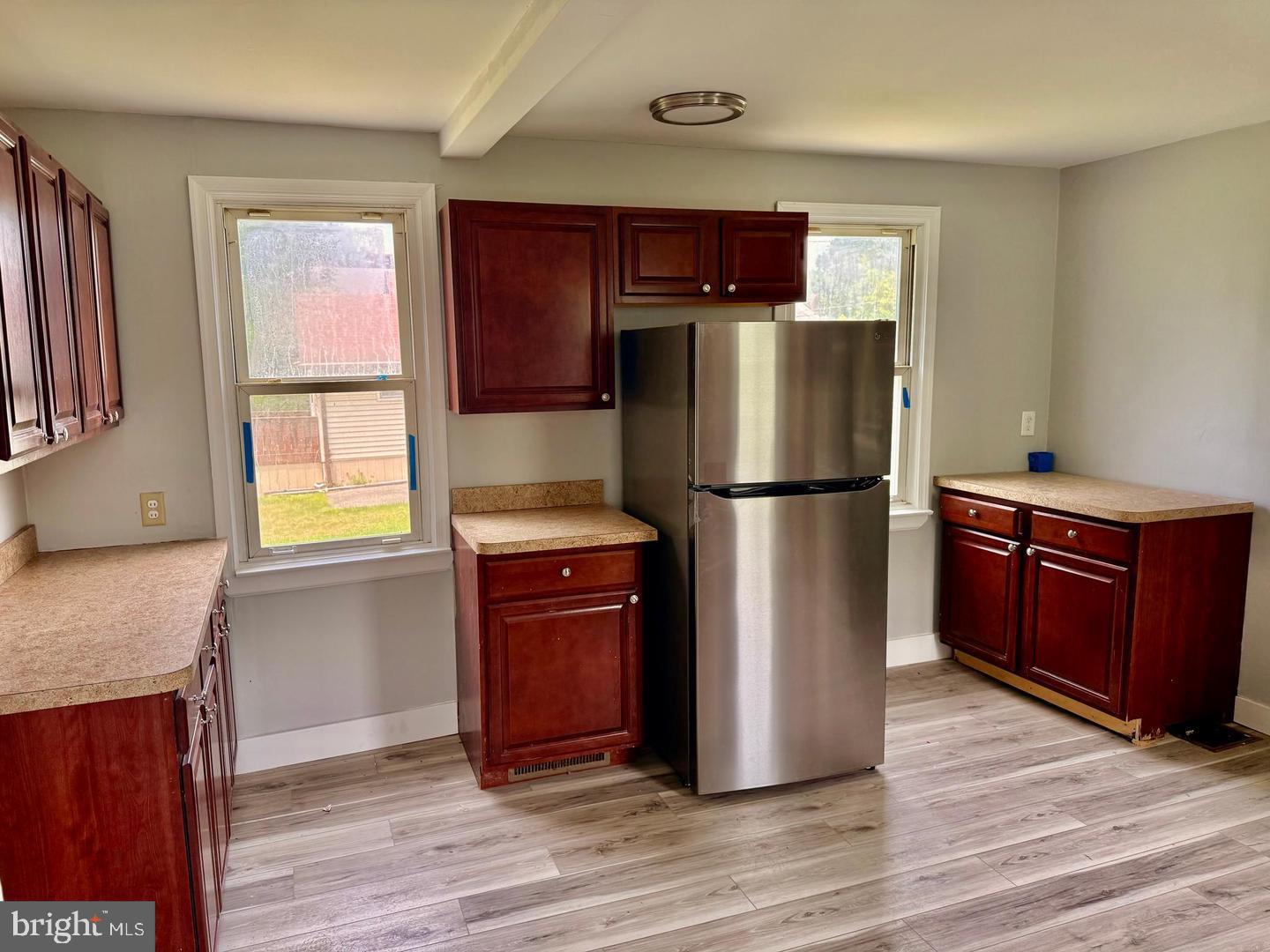 217 Smith Street Salem, NJ 08079 - Photo 9 of 23 a kitchen with stainless steel appliances granite countertop a refrigerator a stove a sink and a refrigerator