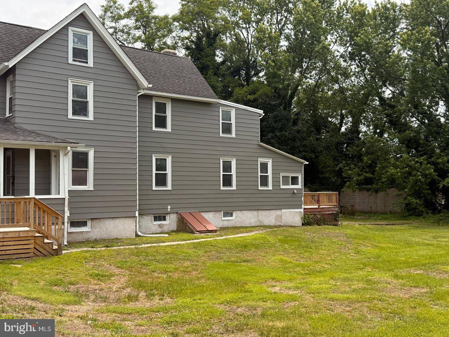 217 Smith Street Salem, NJ 08079 - Photo 4 of 23 a front view of house with yard and swimming pool