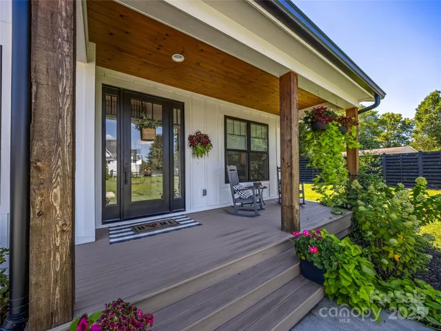a front view of a house with a porch