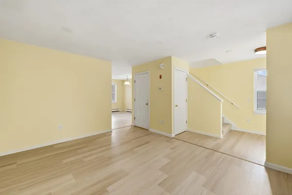 an empty room with windows