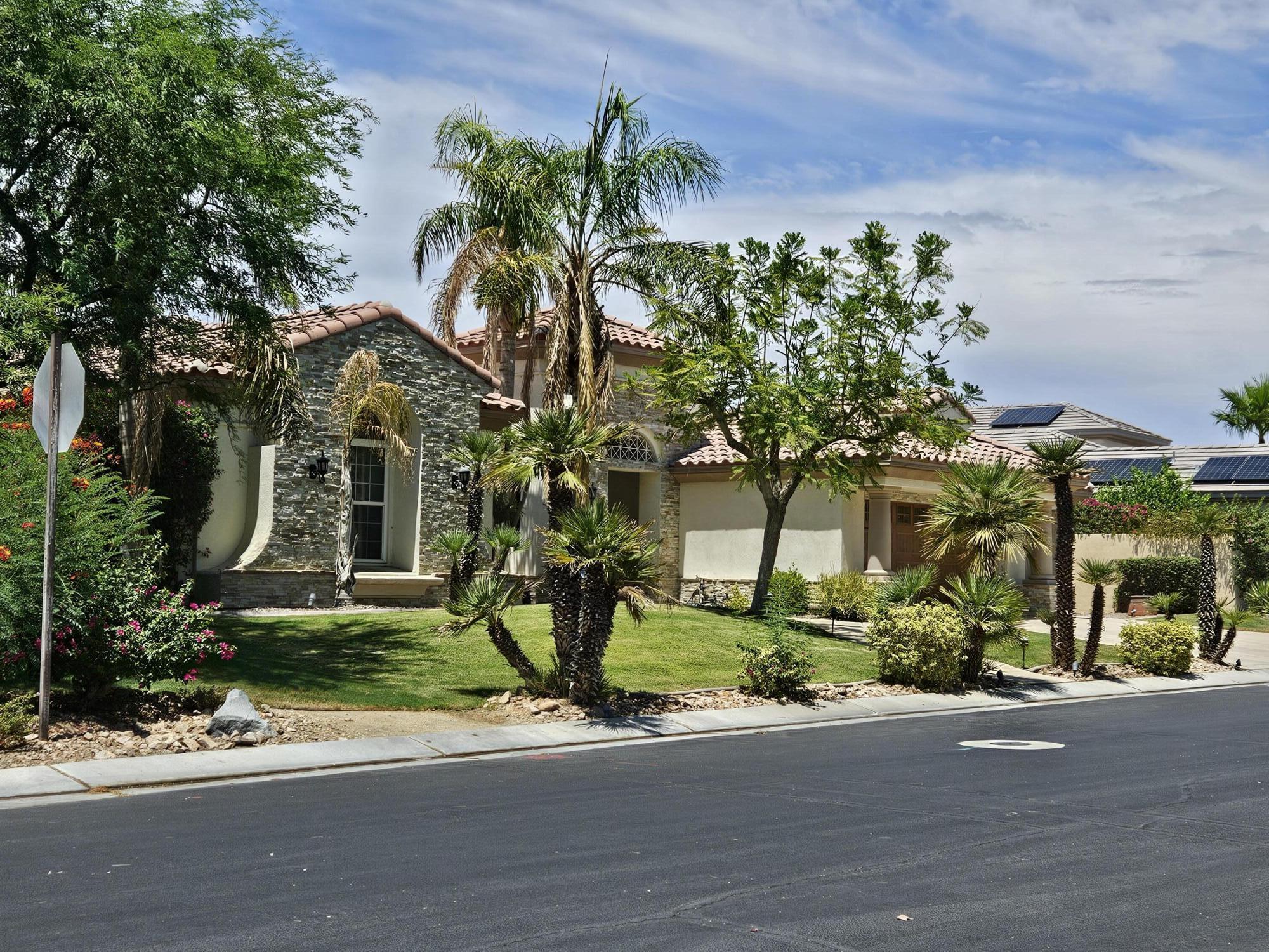 15 Vía Verde Rancho Mirage, CA 92270 - Photo 1 of 23 front view of a house with a street