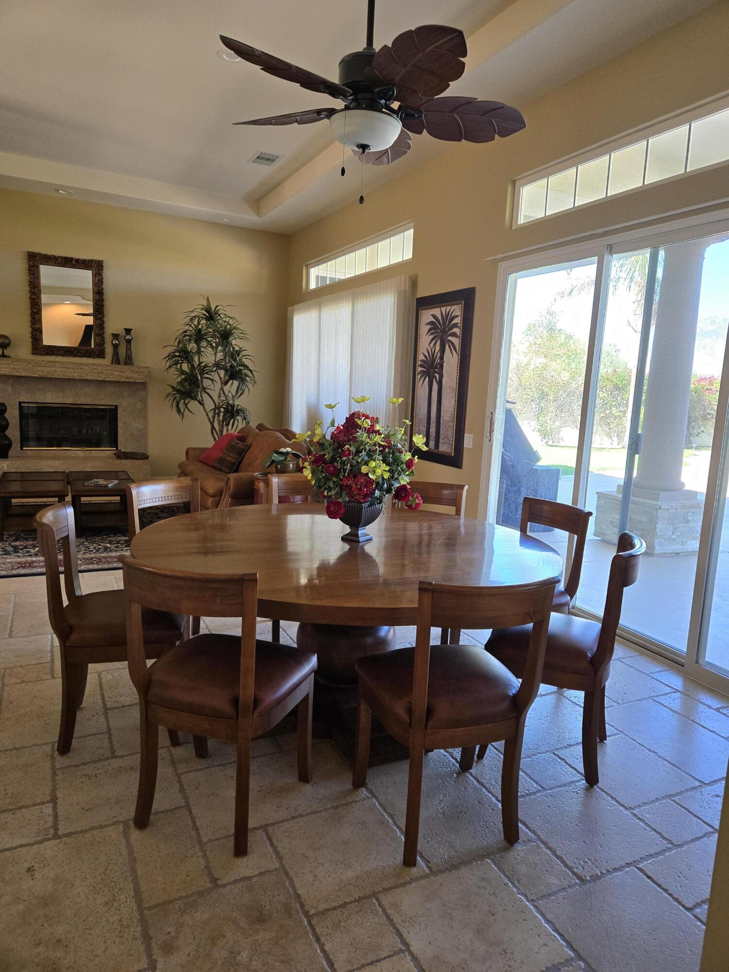 15 Vía Verde Rancho Mirage, CA 92270 - Photo 8 of 23 a view of a dining room with furniture window and wooden floor