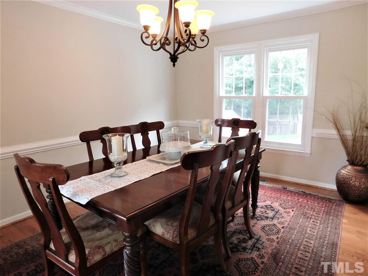 2332 Finley Ridge Lane Raleigh, NC 27615 - Photo 12 of 30 a view of a dining room with furniture window and outside view