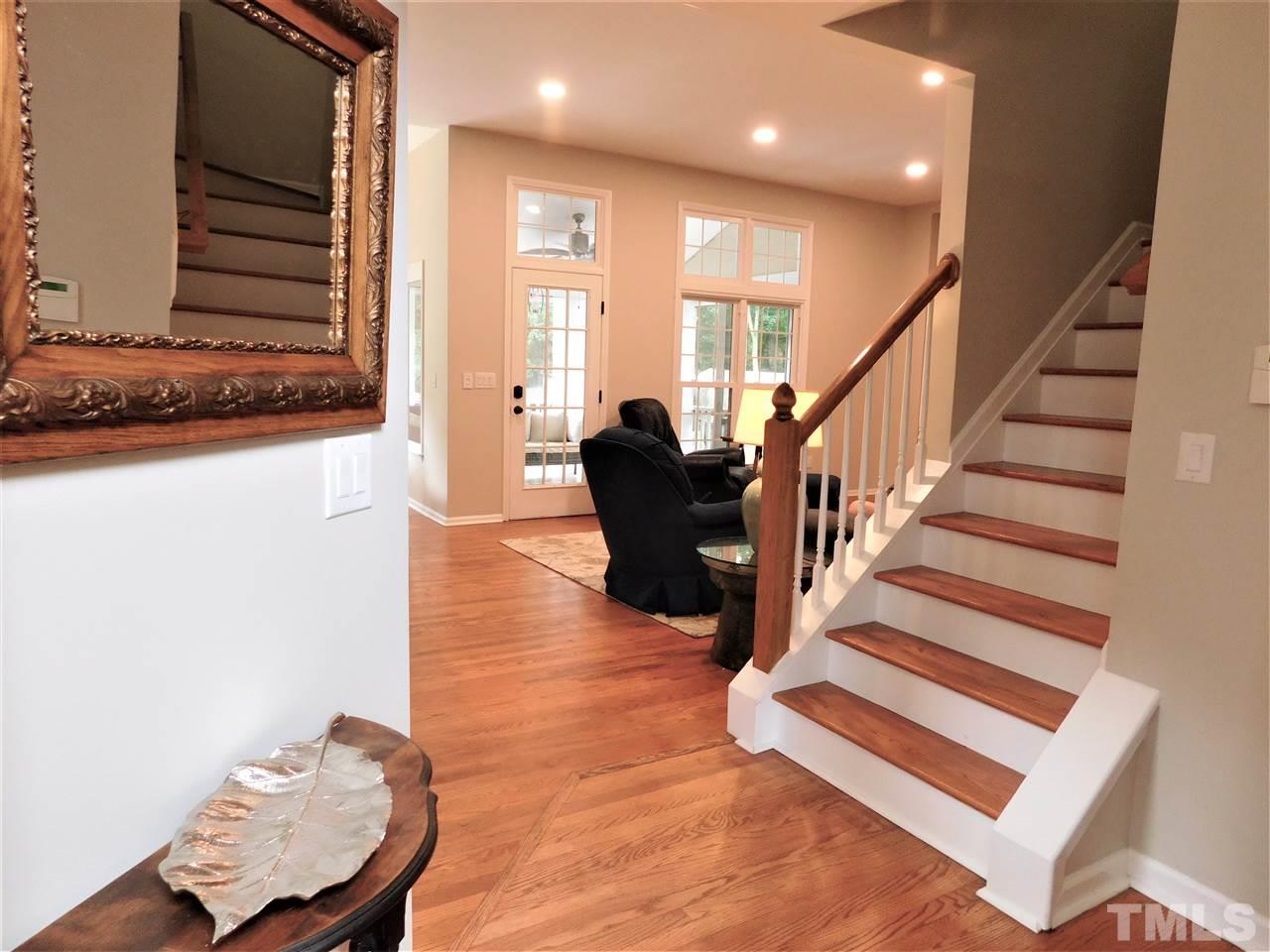 2332 Finley Ridge Lane Raleigh, NC 27615 - Photo 4 of 30 a view of entryway with wooden floor and stairs
