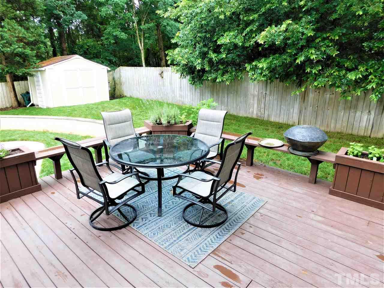 2332 Finley Ridge Lane Raleigh, NC 27615 - Photo 9 of 30 a view of backyard with seating space and wooden floor