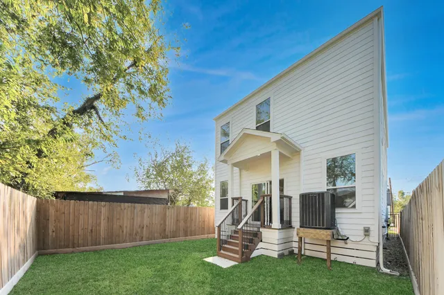 a view of a backyard with a slide