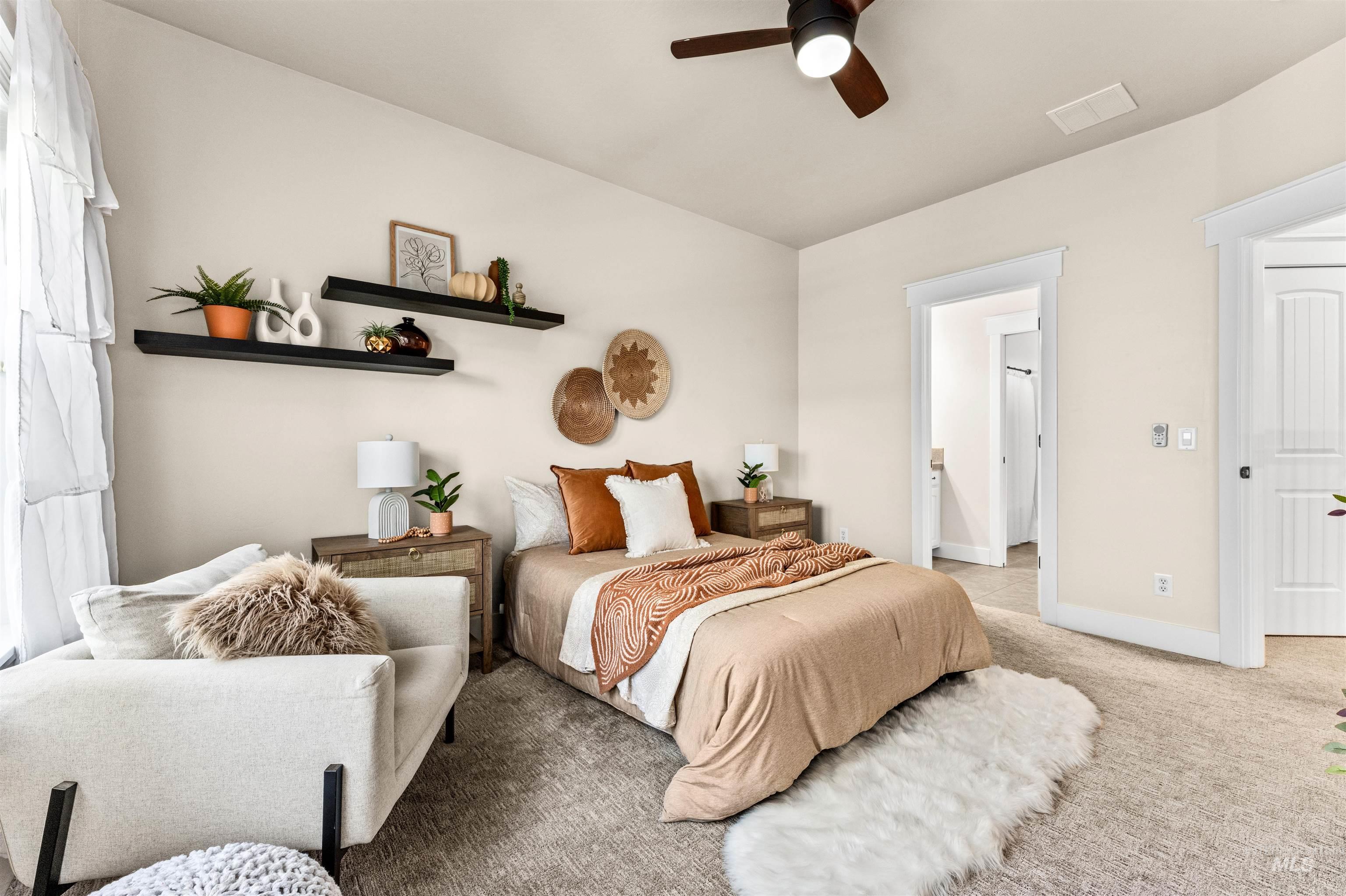 1177 East Riversong Drive Eagle, ID 83616 - Photo 18 of 36 Carpeted bedroom featuring a ceiling fan and baseboards
