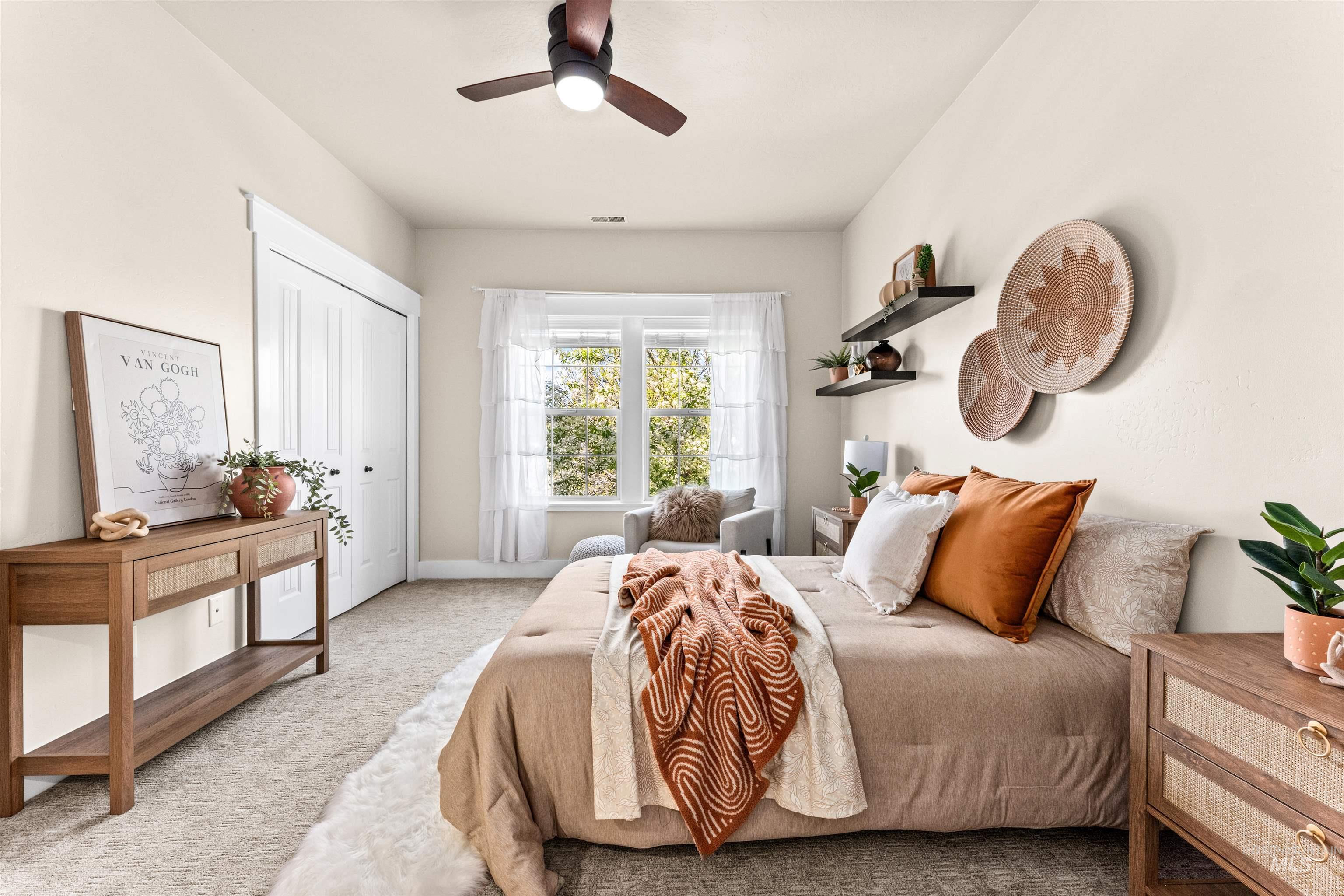 1177 East Riversong Drive Eagle, ID 83616 - Photo 19 of 36 Carpeted bedroom with a closet and a ceiling fan