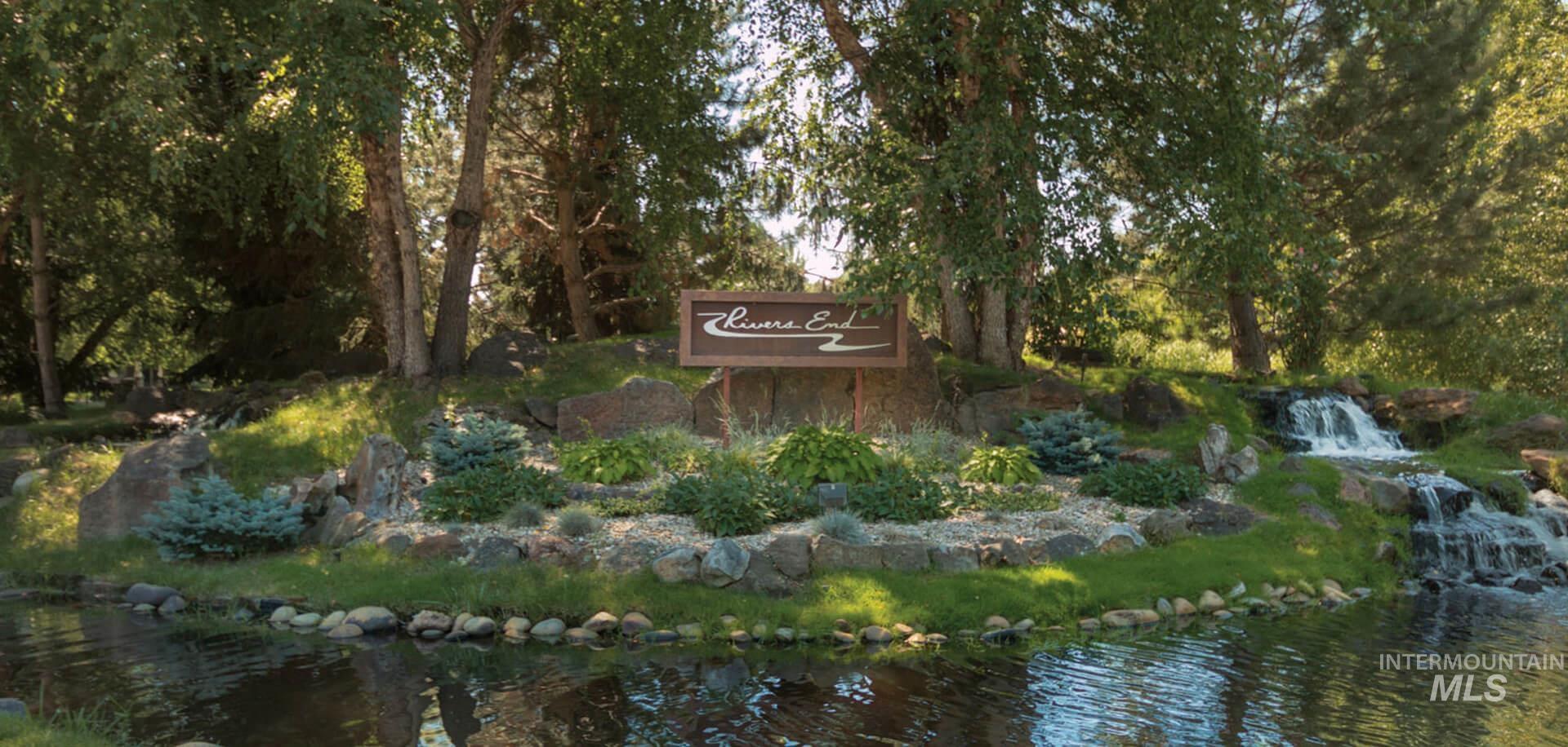 1177 East Riversong Drive Eagle, ID 83616 - Photo 32 of 36 Community / neighborhood sign with a water view