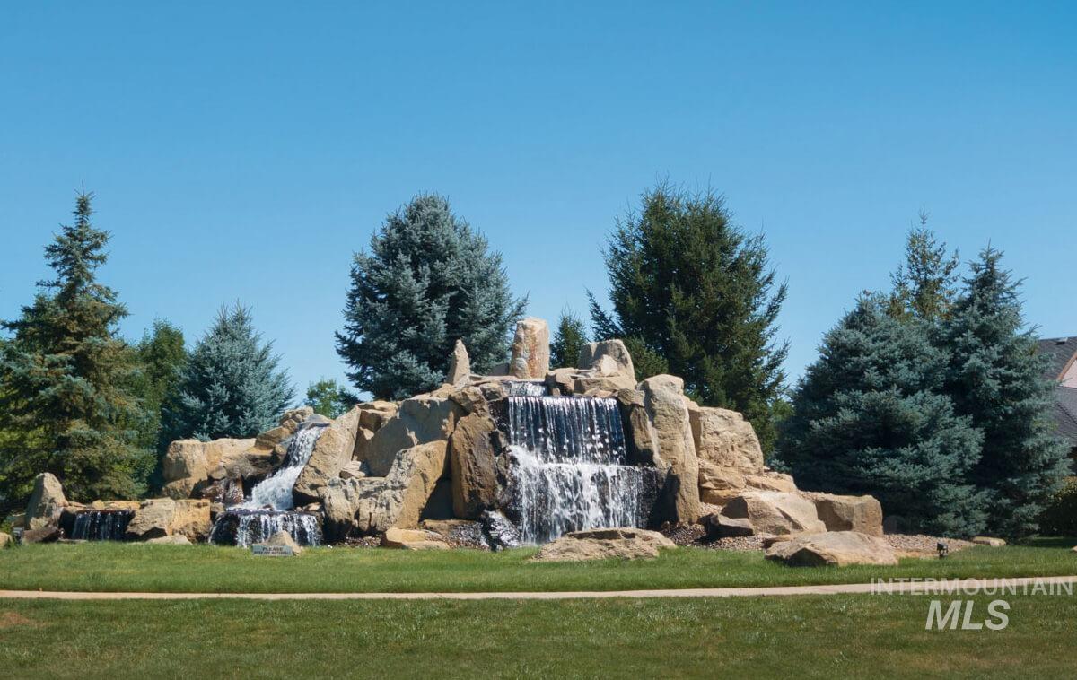 1177 East Riversong Drive Eagle, ID 83616 - Photo 33 of 36 Community / neighborhood sign with a yard