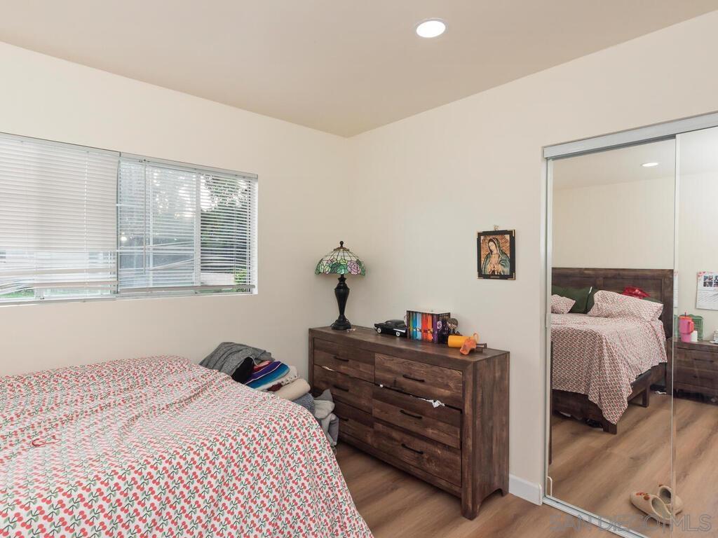 1027 Chestnut Street Escondido, CA 92025 - Photo 21 of 35 a bedroom with a bed and a window