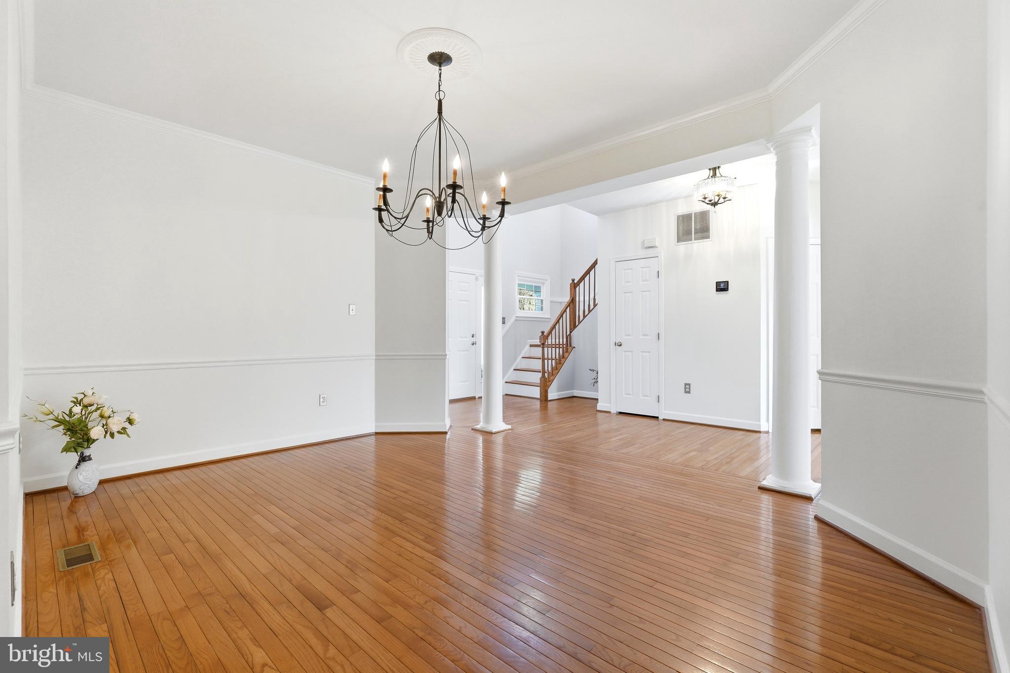 3714 Monitor Place Olney, MD 20832 - Photo 18 of 49 a view of a room with wooden floor chandelier and entryway