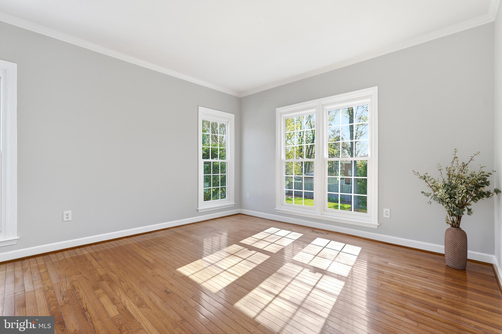 3714 Monitor Place Olney, MD 20832 - Photo 19 of 49 an empty room with wooden floor and windows