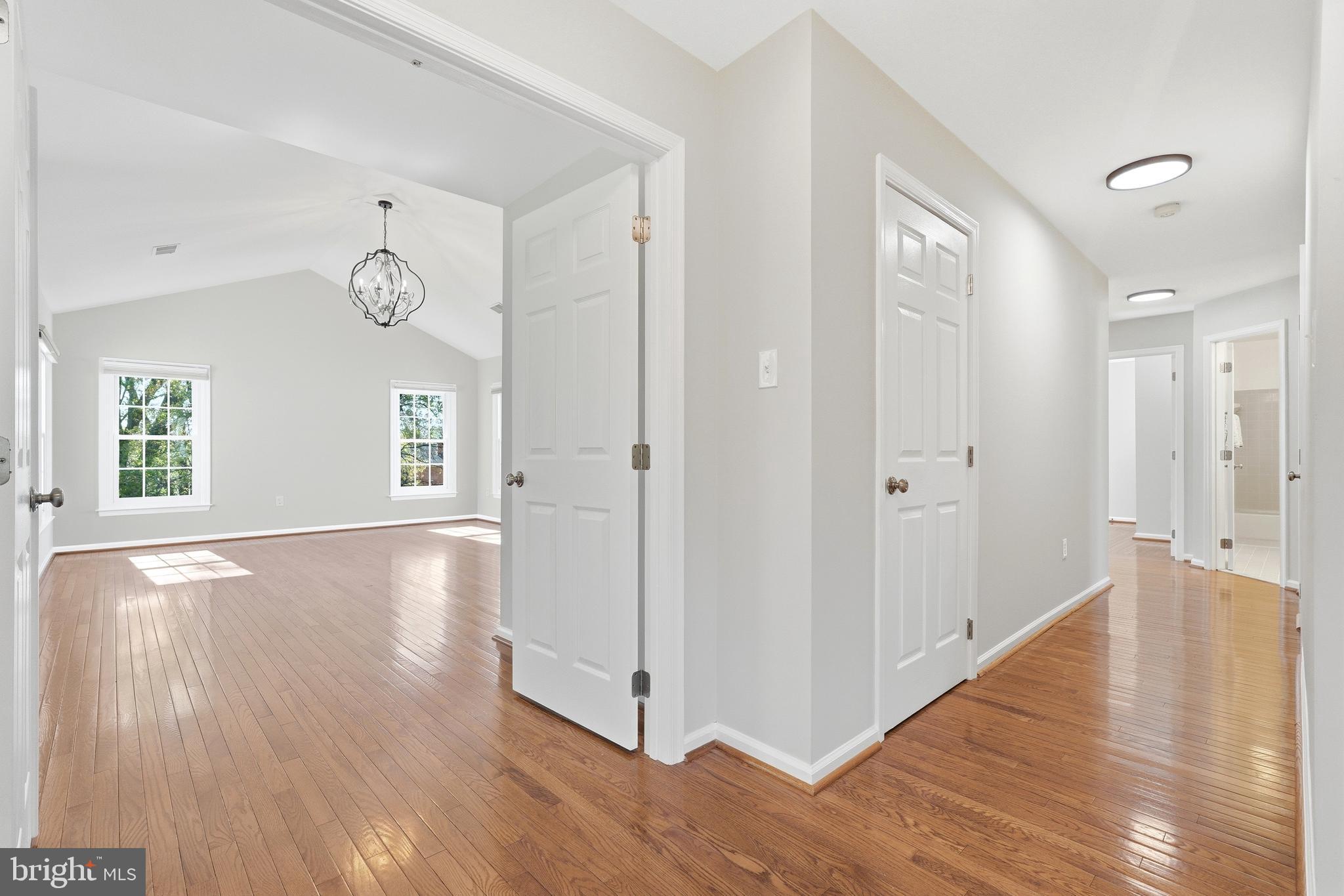 3714 Monitor Place Olney, MD 20832 - Photo 22 of 49 a view of an empty room with wooden floor and a window